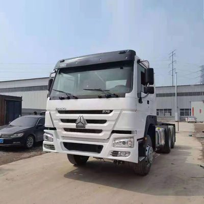 40-60 톤 충전 용량 6X4 375HP 시노트럭 사용 된 HOWO 트럭 트랙터 저렴한 가격