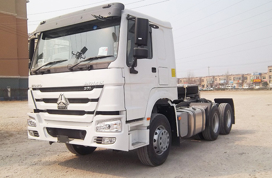 시노트루크 HOWO 6X4 10 휠 사용 된 프라임 모버 트랙터 헤드 트럭 중량 운송