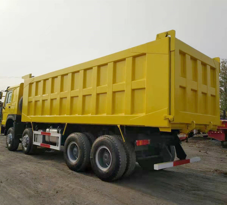 시노트루크 HOWO 8X4 371HP 수동 변속기와 함께 사용 된 노란색 덤프 트럭